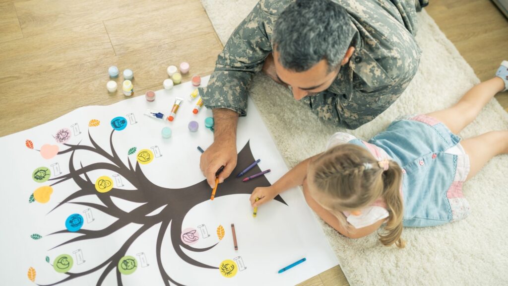 father and daughter coloring a family tree